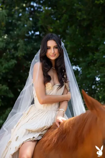 Latina Brunette Rides a Horse and Spreads Her Legs in Boots