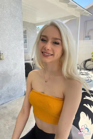 Blonde with Pierced Tits Spreads Outdoors