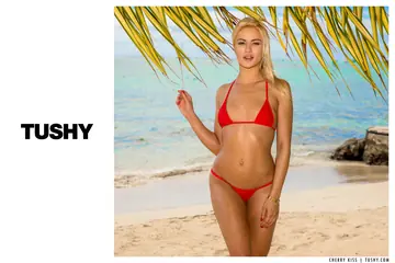 Cherry Kiss – Skinny Blonde Takes Anal Doggy Style on the Beach