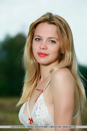 Elisa Liv – Blonde in Lingerie Strips and Spreads on a Forest Blanket