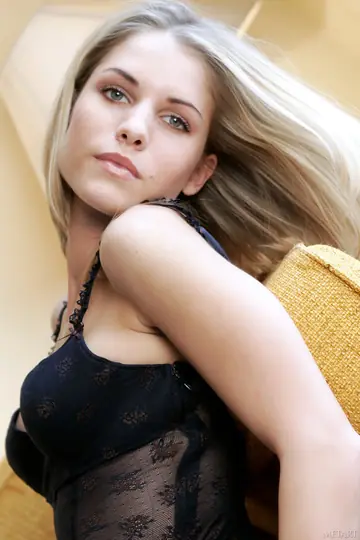 Slim Blonde Spreads Her Shaved Pussy While Posing Nude