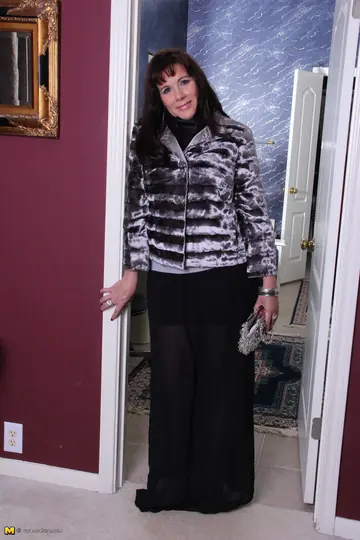 Thick Brunette MILF Strips Out of Her Skirt in the Bathroom