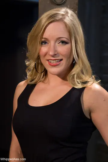 Maitresse Madeline Marlowe – Blonde in Lingerie and Stockings Dominates Bound Partner
