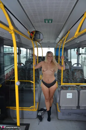 Blonde MILF in Socks Poses Naked on a City Bus and Spreads Her Legs