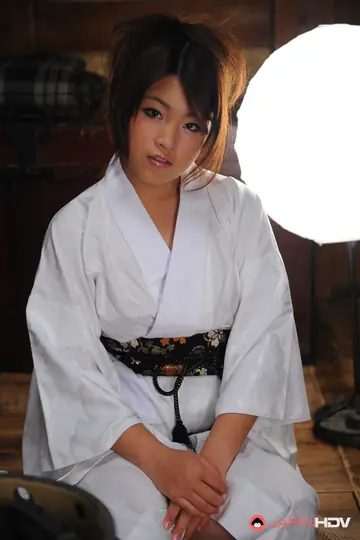 Japanese Brunette Opens Kimono and Poses Nude