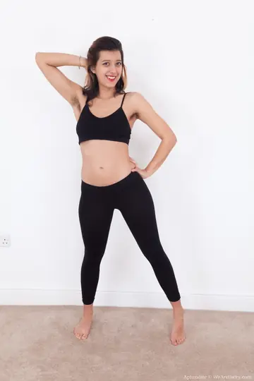 Pierced Woman in Yoga Pants Spreads Her Hairy Pussy