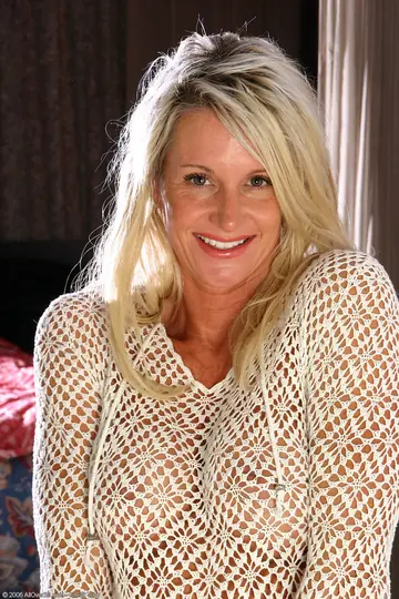 Mature Blonde MILF with Big Tits Spreads Her Shaved Pussy