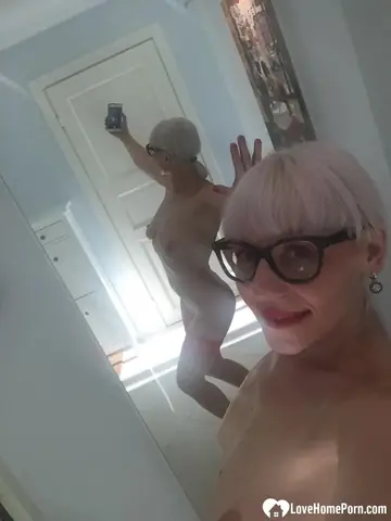 Blonde MILF Strips and Flashes Her Big Tits in the Mirror
