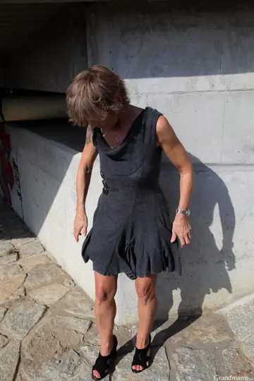 Blonde in a Dress Kneels Outdoors for a Blowjob