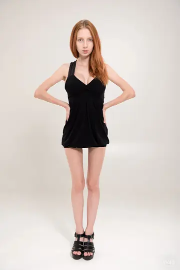 Slim Redhead Oils Up Her Big Natural Tits