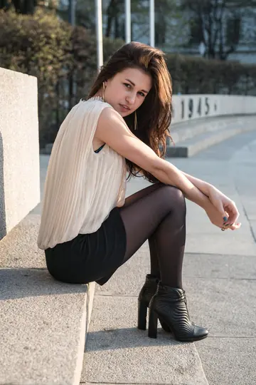 Brunette Lifts Her Skirt and Spreads Her Pussy Lips Wide