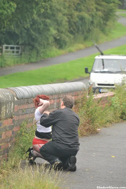 Thick Redhead Licks Boots and Crawls in Restraints Outdoors – photo 16 of 16