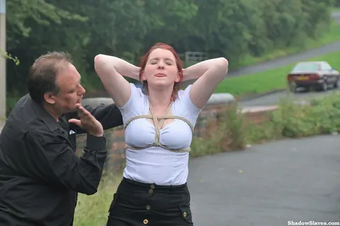 Thick Redhead Licks Boots and Crawls in Restraints Outdoors – photo 8 of 16