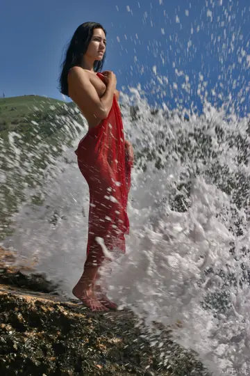 Woman Strips Nude on the Beach and Poses in the Open Air