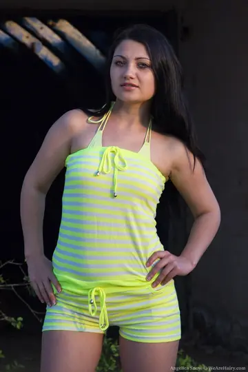Angelica Snow – Russian Brunette Shows Her Hairy Pussy on a Rock Outdoors