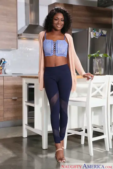 Curly Ebony Brunette Shows Her Big Tits in High Heels