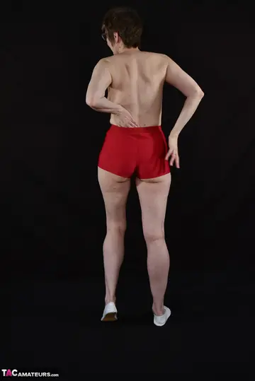 Tall European MILF Strips Nude in Glasses