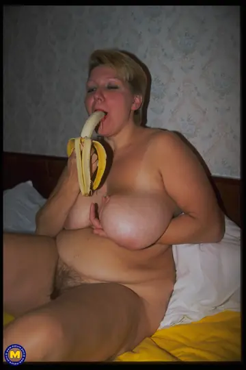 Mature European Blonde Strips and Shows Her Big Tits