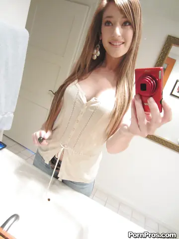 Brunette Strips Out of Her Jeans in the Bathroom Mirror