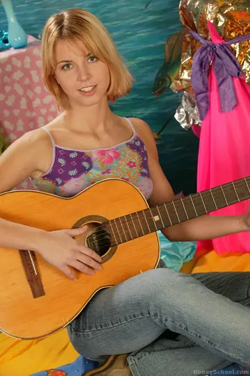 Sharon M – Tall Czech Blonde Toys Her Pussy After Playing Guitar