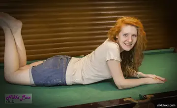 Busty Redhead MILF Strips Out of Her Shorts by the Pool