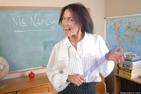 Nancy Vee: Brunette MILF Strips Naked and Shows Her Tattoo – photo 1 of 16