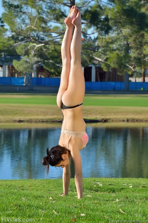 Brunette in Pigtails Pulls Bikini Aside and Spreads in Public – photo 17 of 21