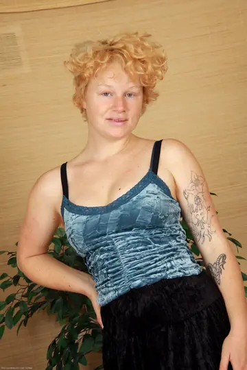 Pale Redhead MILF with Big Tits Undresses and Spreads