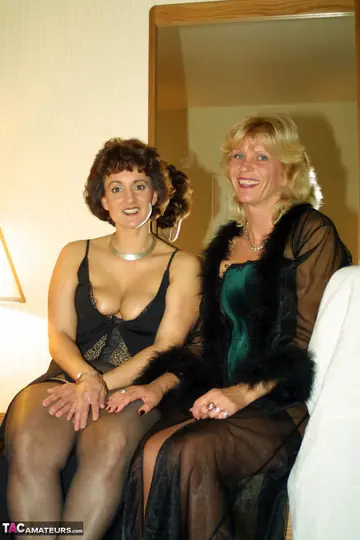 Two Thick Blonde MILFs in Stockings Have Lesbian Sex at a Motel