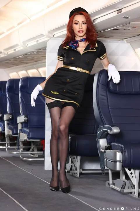 Busty Trans Woman in Uniform and Stockings Fucks in a Threesome – photo 2 of 21