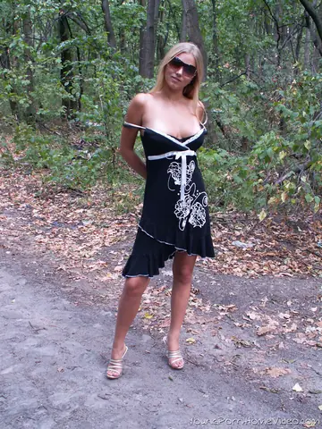 Tanned Babe Strips Out of Her Bikini in the Forest
