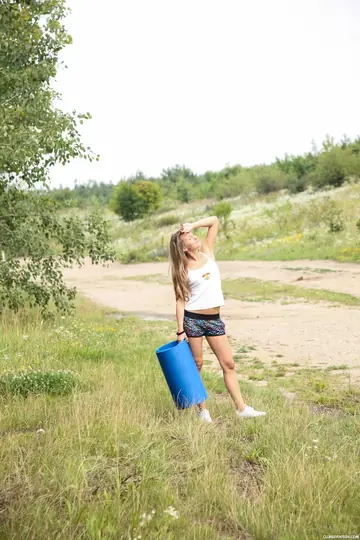 European Woman Spreads Her Shaved Pussy in Public