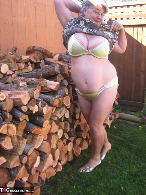 European BBW Strips by a Wood Pile Outdoors – photo 9 of 20