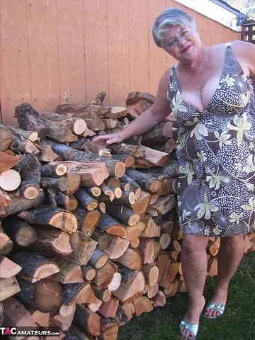 European BBW Strips by a Wood Pile Outdoors