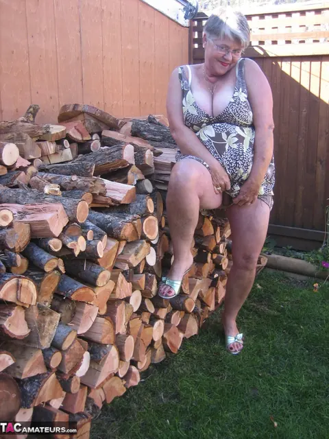 European BBW Strips by a Wood Pile Outdoors – photo 7 of 20