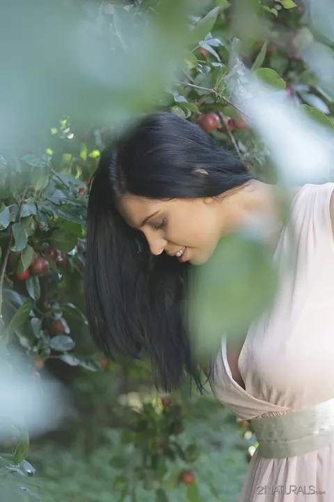 Kira Queen: Russian Brunette Picks Fruit Outdoors in a Skirt – photo 10 of 17