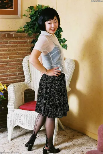 Short-Haired Asian Woman Peels Off Her Pantyhose to Reveal Her Hairy Pussy