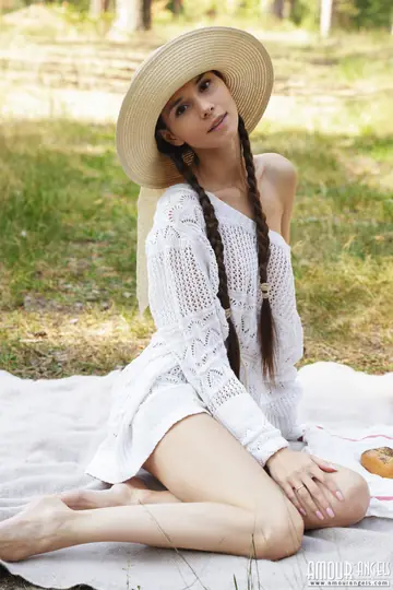 Leona Mia – Skinny Brunette in Pigtails Spreads Her Ass in the Forest