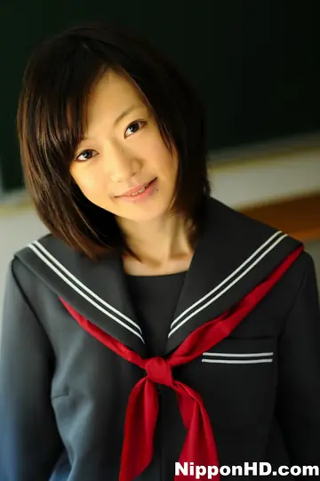 Japanese Brunette Poses in Uniform with Skirt and Socks
