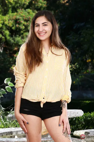 Petite Brunette Pulls Shorts Aside and Spreads Outdoors