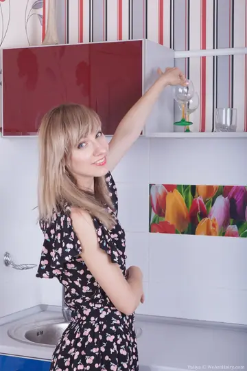 Woman Undresses in the Kitchen Showing Her Hairy Bush