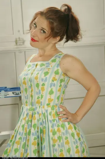Dirty Angie – Tall Redhead MILF Strips Out of Her Vintage Dress and Lingerie