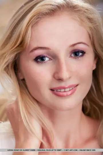 Leona Honey – Petite Czech Blonde Pulls Her Shorts Aside on the Chair