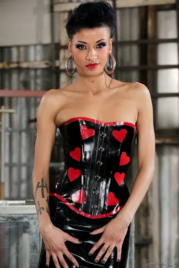 Slim Ebony Latina in a Latex Skirt and Heels Flaunts Her Body