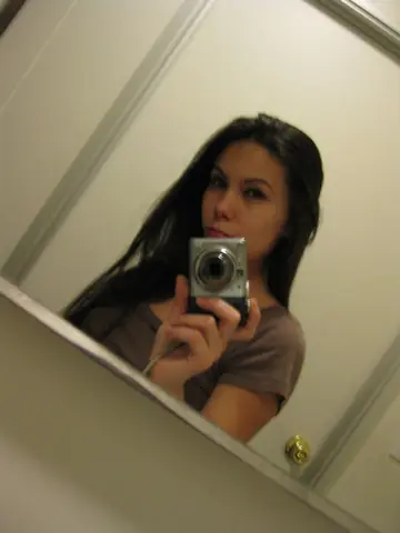 Petite European Shows Off Her Small Tits and Ass in Public Mirror Selfie