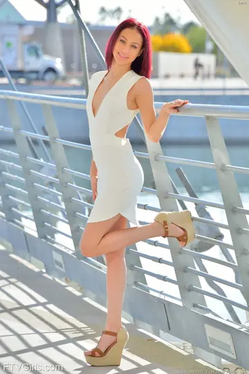 Redhead Flashes Her Ass and Pussy on a Bridge in High Heels