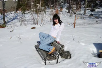 Emily Love – Brunette with Natural Tits Poses in Jeans Outdoors