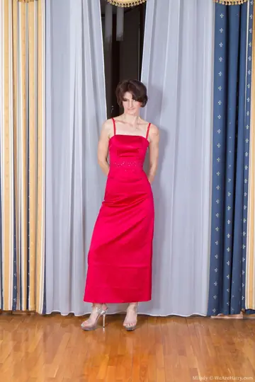 Slim Short-Haired MILF Strips Out of Her Lingerie for Toy Play