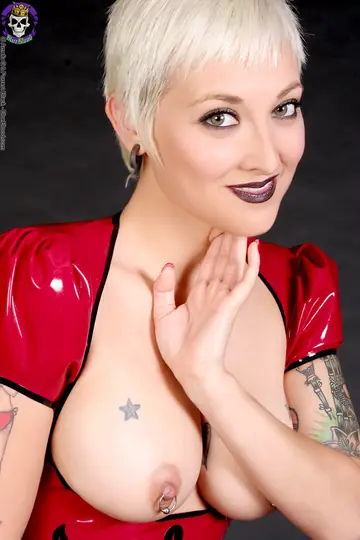 Blonde MILF in Latex Lingerie Shows Her Pierced Tits