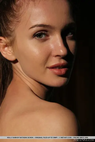 Holly Haim – Brunette Lifts Her Skirt to Show Her Shaved Pussy and Natural Tits